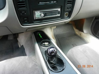 Illustration for article titled For $8,800, This 1995 Chevy Impala SS Is A Six Shooter